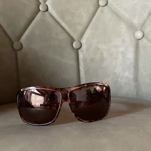 MAX STUDIO Tortoise Sunglasses with brown lenses.